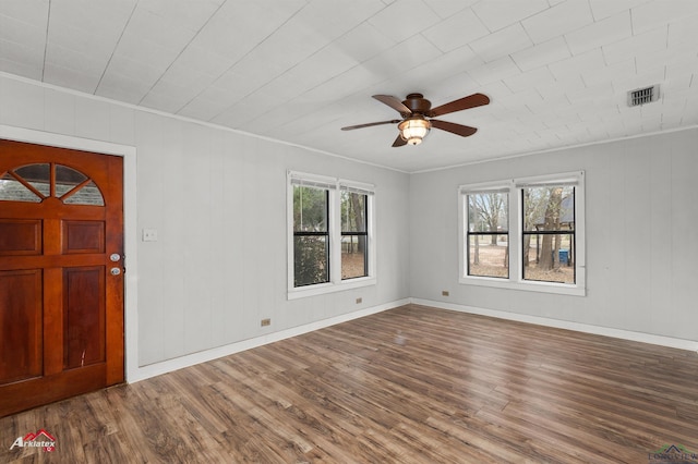 foyer entrance featuring ceiling fan, ornamental molding, and hardwood / wood-style flooring