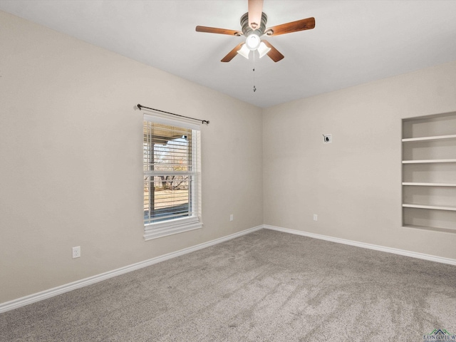 unfurnished room with carpet flooring