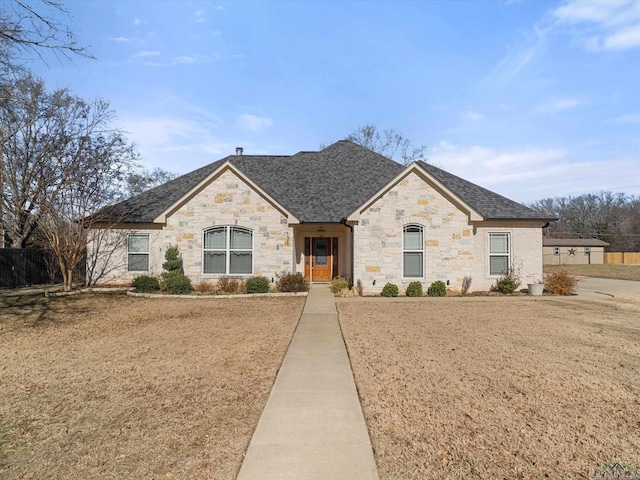 view of front facade with a front yard