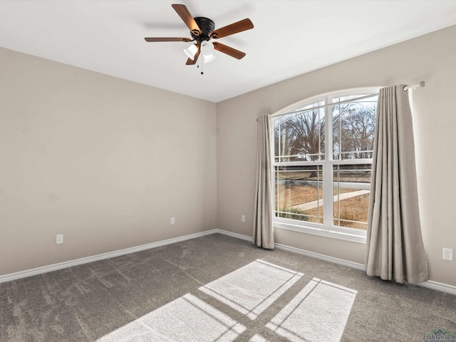 carpeted empty room with ceiling fan