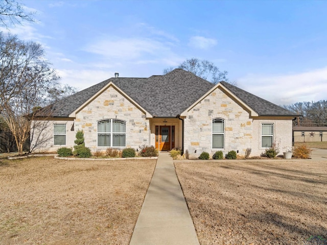 view of front of house with a front lawn