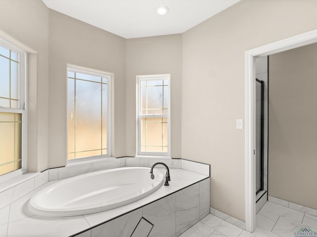 bathroom with plus walk in shower