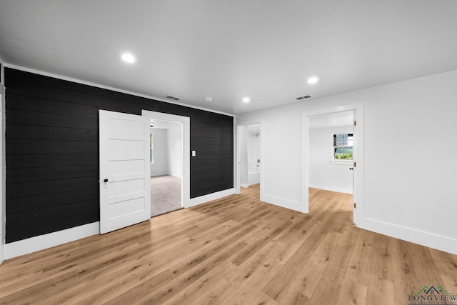 913 Church St, Winnsboro, TX 75494 - spare room with baseboards, recessed lighting, and light wood-type flooring