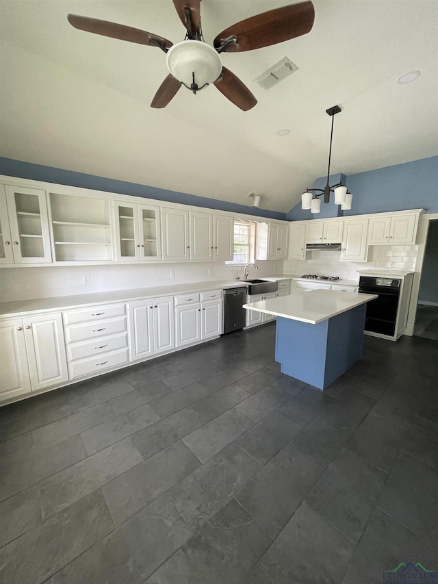 kitchen with stainless steel dishwasher, vaulted ceiling, white cabinets, a kitchen island, and hanging light fixtures