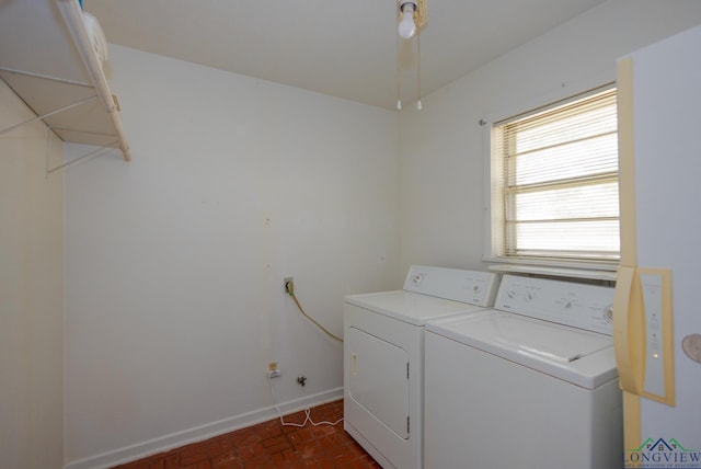 laundry room featuring independent washer and dryer