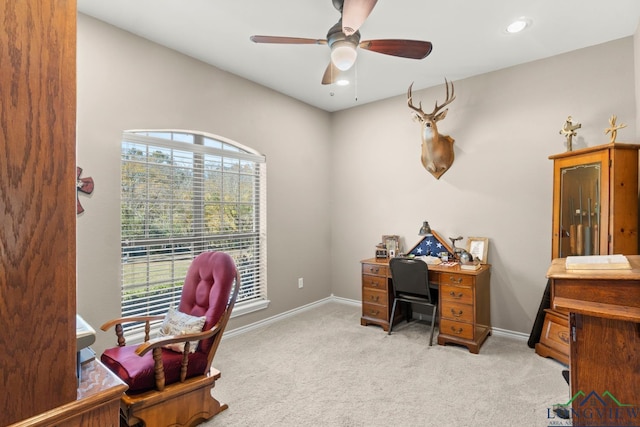 office featuring light colored carpet and ceiling fan