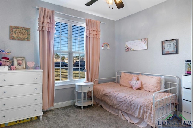 bedroom with ceiling fan and carpet floors