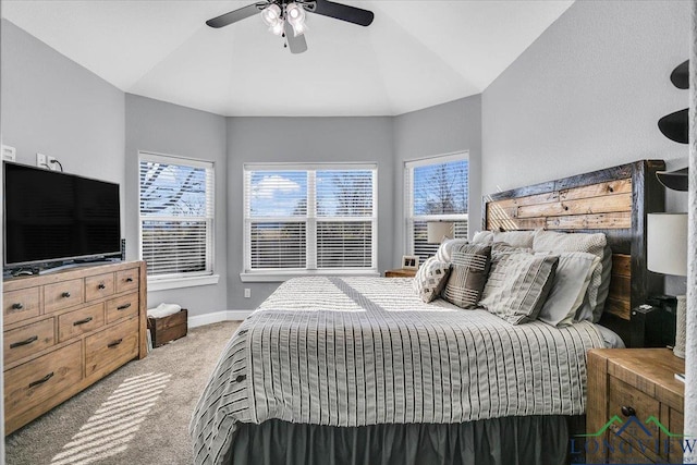 bedroom featuring ceiling fan, carpet floors, and lofted ceiling