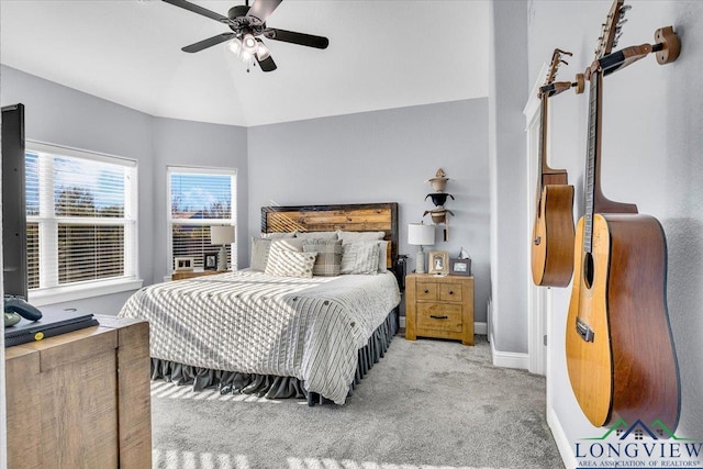 bedroom with light carpet, ceiling fan, and lofted ceiling