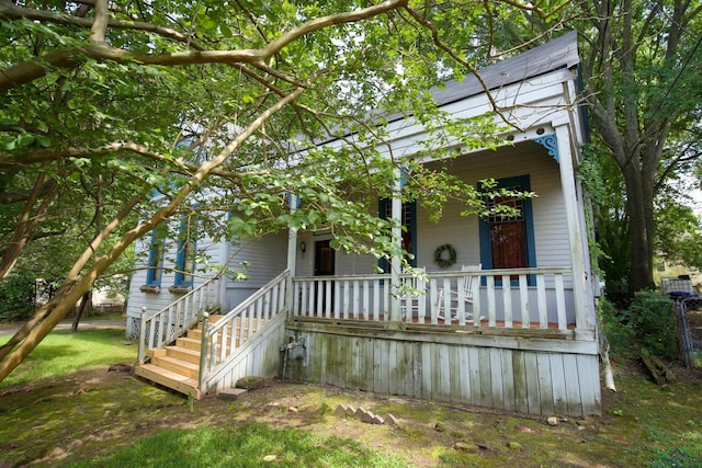800 E Austin St, Marshall, TX 75670 - view of front of house with a porch and stairs
