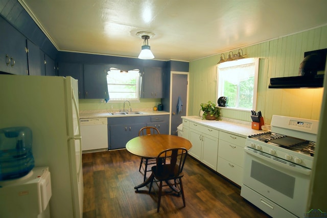 800 E Austin St, Marshall, TX 75670 - kitchen featuring white appliances, dark wood-style flooring, light countertops, ventilation hood, and crown molding