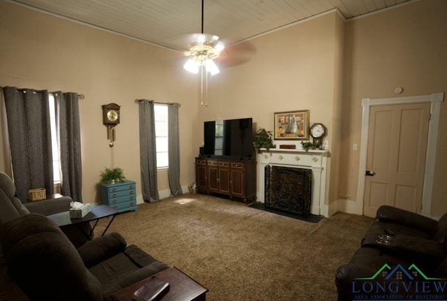 800 E Austin St, Marshall, TX 75670 - living room featuring wooden ceiling, a fireplace with flush hearth, carpet floors, and a ceiling fan