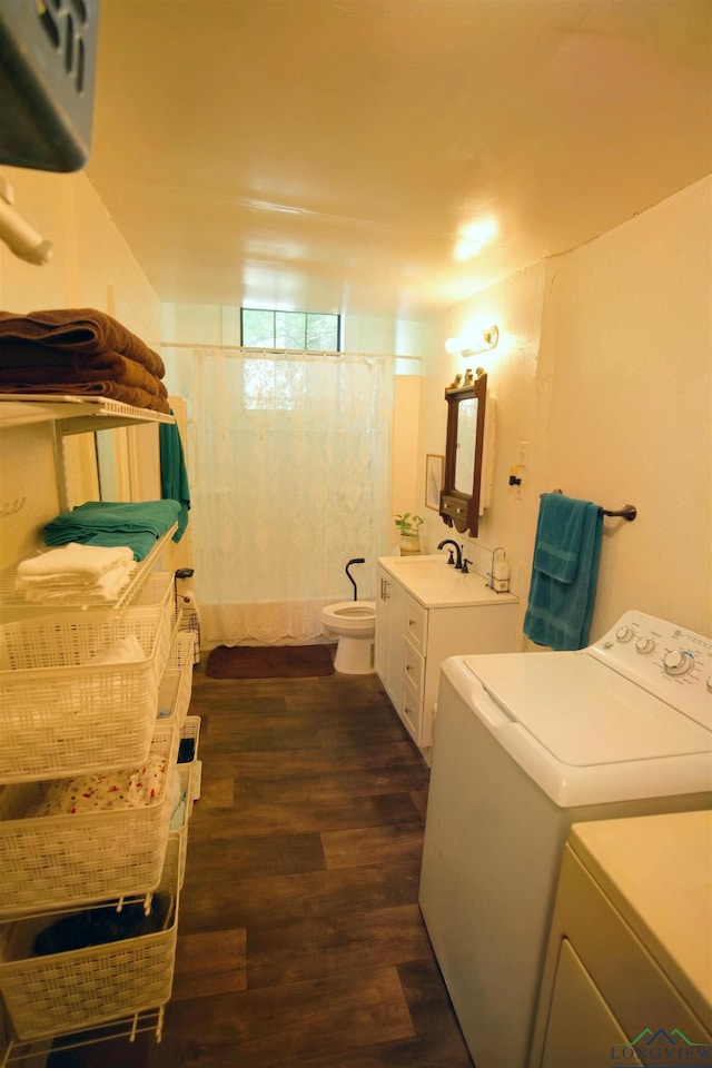 800 E Austin St, Marshall, TX 75670 - full bath with separate washer and dryer, wood finished floors, vanity, and a shower with shower curtain