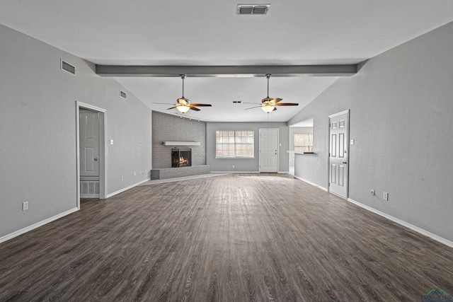 unfurnished living room featuring ceiling fan, vaulted ceiling with beams, dark wood-type flooring, and a brick fireplace