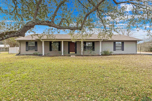 ranch-style house with a front lawn