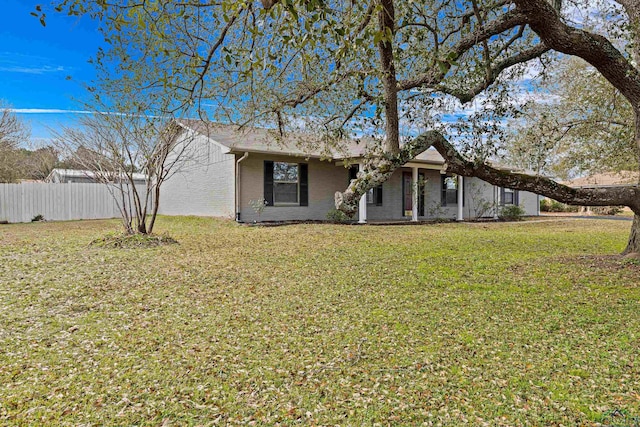 ranch-style house with a front lawn