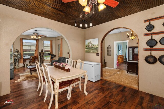 kitchen featuring wood ceiling, light brown cabinets, white refrigerator, dark hardwood / wood-style flooring, and stainless steel range with electric stovetop