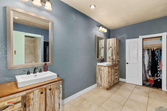 bathroom featuring vanity and tile patterned flooring