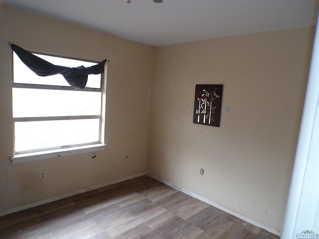 empty room featuring light hardwood / wood-style floors