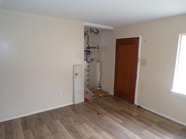 spare room with light hardwood / wood-style floors