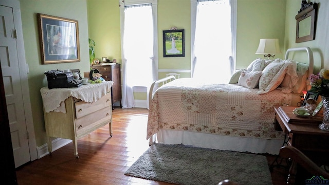 bedroom featuring hardwood / wood-style flooring