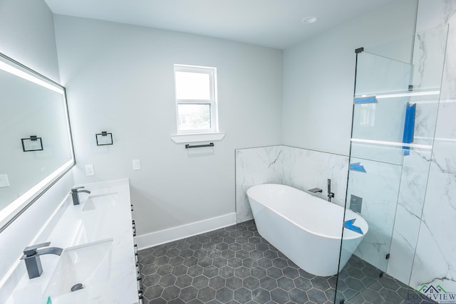 bathroom featuring plus walk in shower and vanity