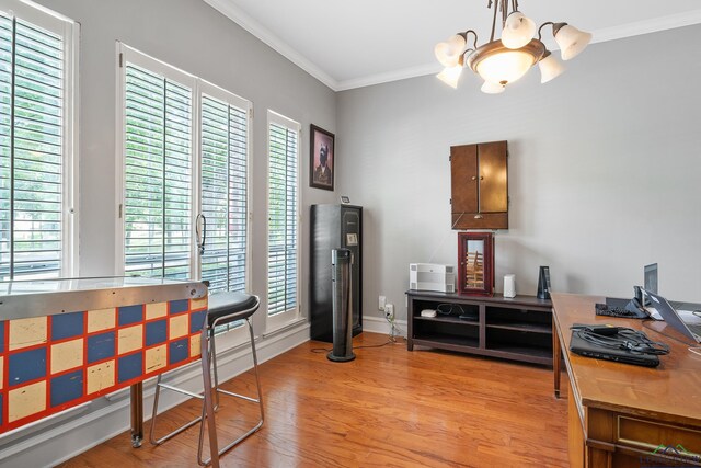 1303 Lesley, Longview, TX 75604 - interior space featuring ornamental molding, light wood finished floors, a notable chandelier, and plenty of natural light