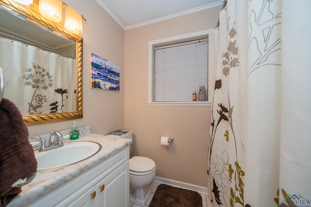 bathroom featuring vanity, crown molding, and toilet