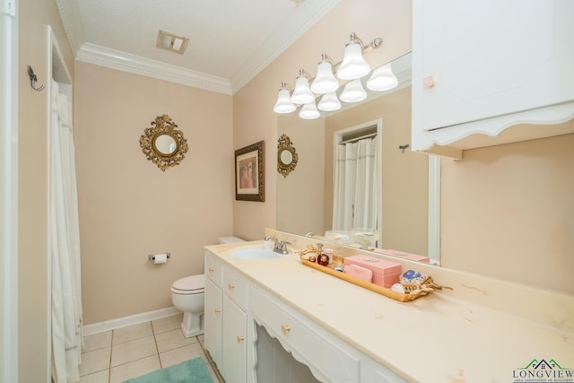 bathroom featuring tile patterned flooring, ornamental molding, vanity, and toilet