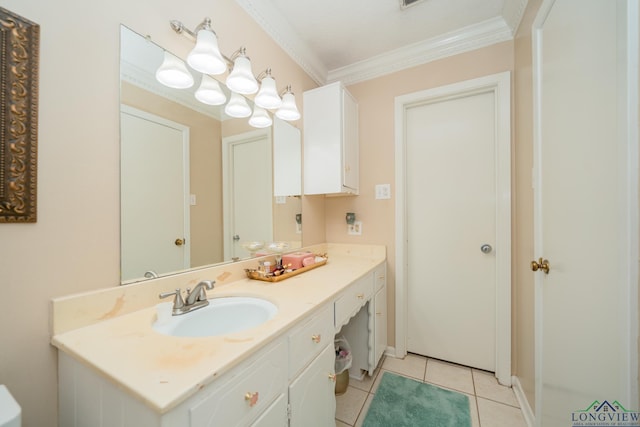 bathroom featuring tile patterned floors, ornamental molding, and vanity