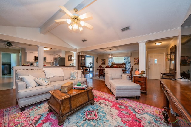 living room with dark wood-type flooring, lofted ceiling with beams, decorative columns, and ceiling fan