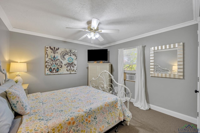 carpeted bedroom featuring ornamental molding, baseboards, and a textured ceiling