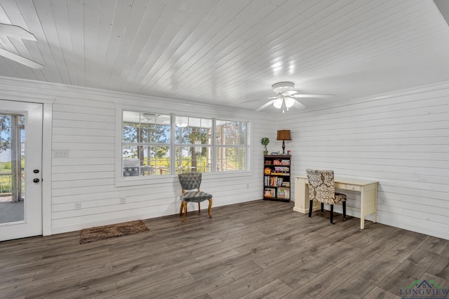interior space with wood finished floors, ceiling fan, and wooden ceiling