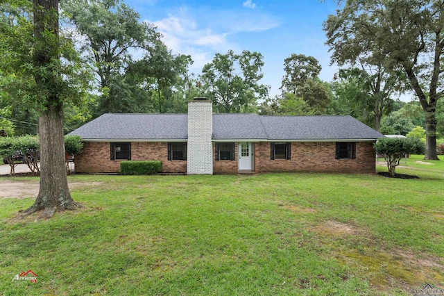 ranch-style home with a front yard