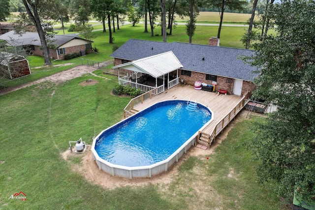 view of swimming pool featuring a wooden deck