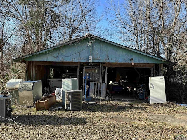 18335 Fm 1716 E, Tatum, TX 75691 - exterior space with central AC unit