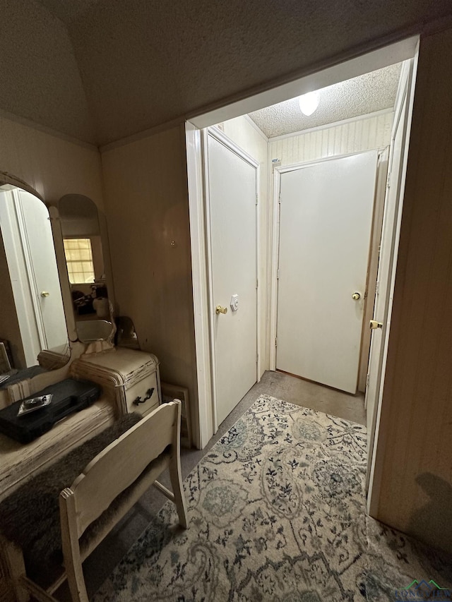 18335 Fm 1716 E, Tatum, TX 75691 - interior space with lofted ceiling and a textured ceiling