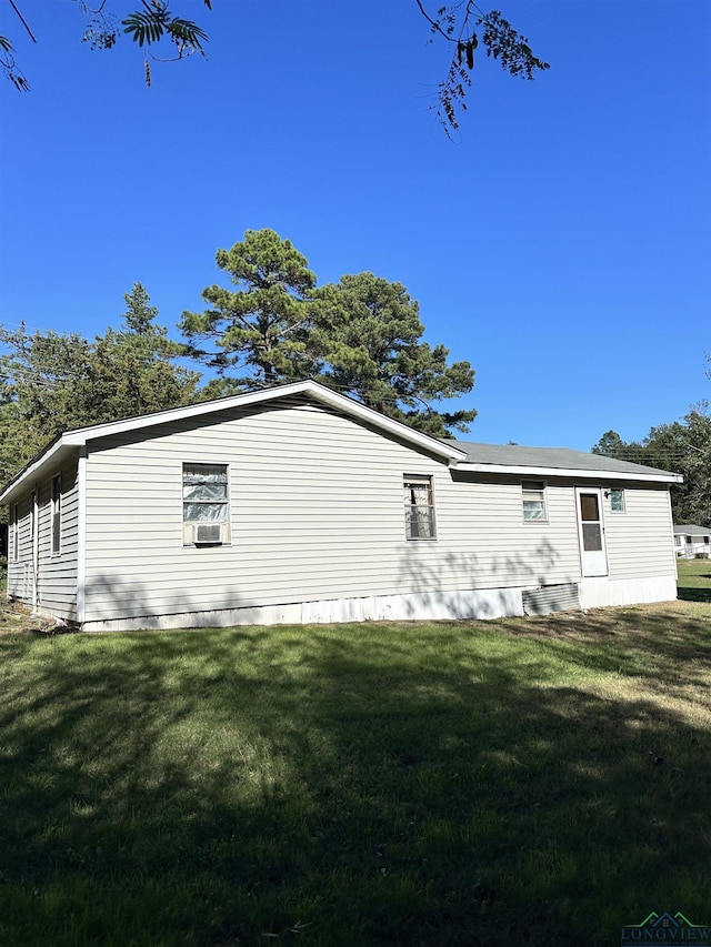 view of home's exterior featuring a yard