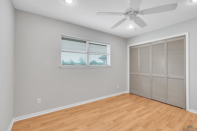 unfurnished bedroom featuring a closet, ceiling fan, and light hardwood / wood-style floors