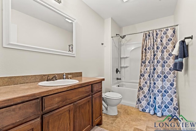 full bath featuring vanity, shower / bath combo with shower curtain, and toilet