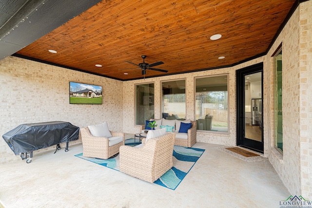 view of patio / terrace featuring ceiling fan and an outdoor hangout area