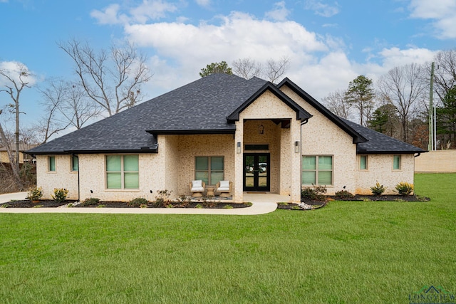 view of front of property with a front lawn