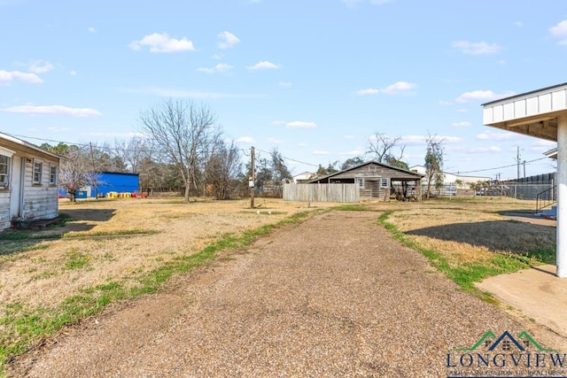 view of yard with fence