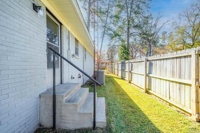 view of yard featuring central AC