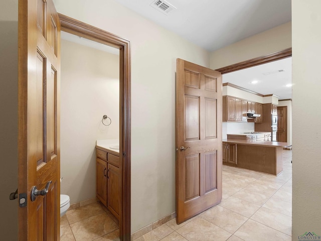 interior space with light tile patterned floors