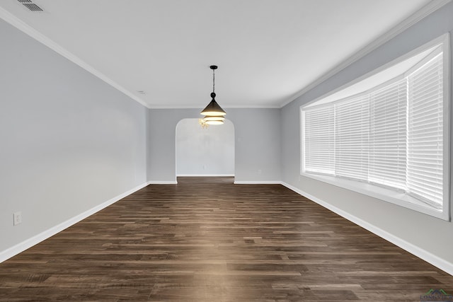 unfurnished dining area with crown molding and dark wood-type flooring