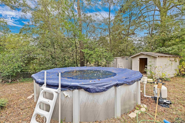 view of pool featuring a storage unit