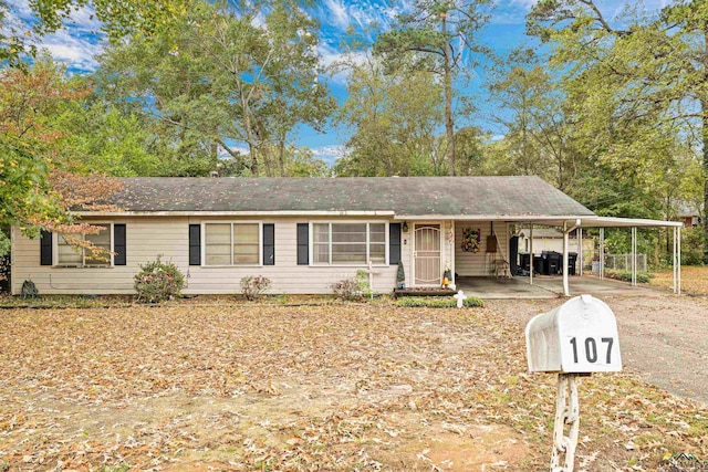 view of front of house featuring a carport