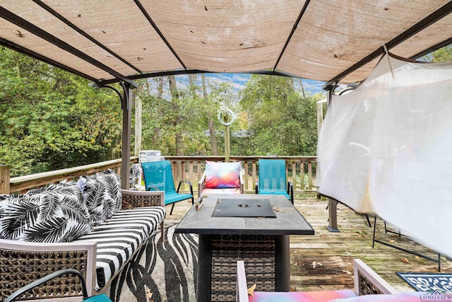 wooden deck with an outdoor hangout area