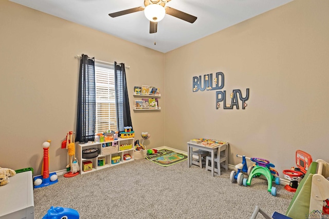 game room featuring carpet floors and ceiling fan